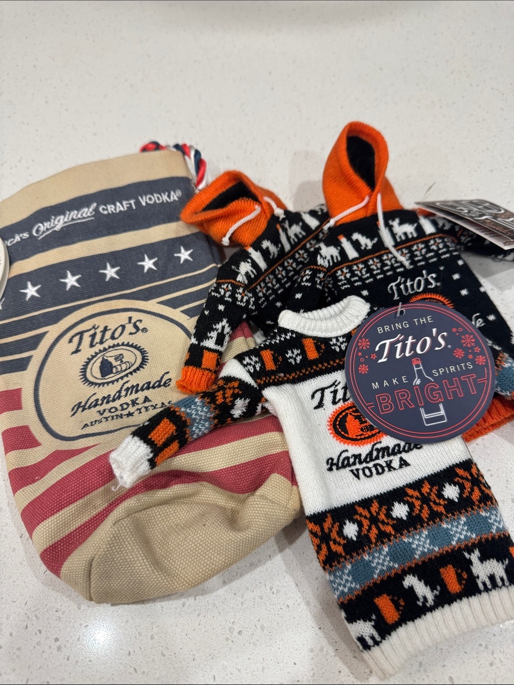 Tito’s vodka bag and sweaters - White & Orange